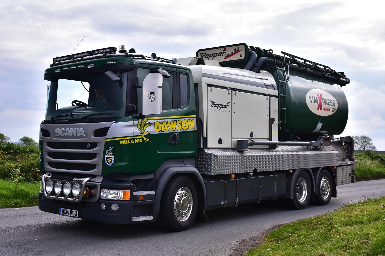 Green Circle Feeds Scania Tropper Power Jet mill-and-mix truck on a rural road